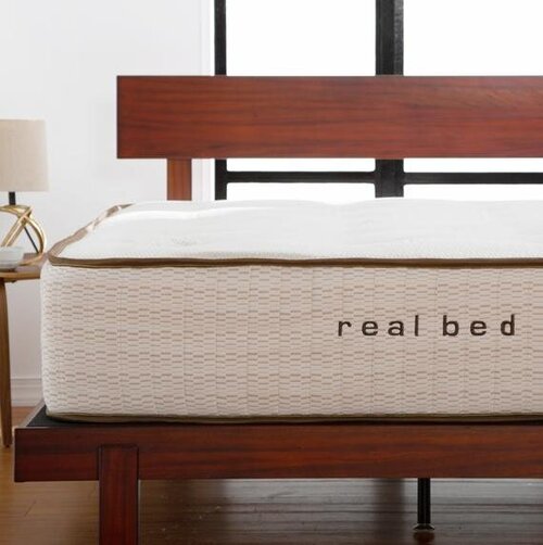 Image showing the Real Bed, a mattress combining natural latex and pocketed coils, a hypo-allergenic and chemical free mattress solution.